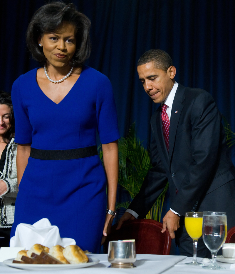 Always the gentleman: President Barack Obama pulls a chair out for first lady Michelle Obama at the National Prayer Breakfast in February 2009.SAUL LOEB/AFP/Getty Images